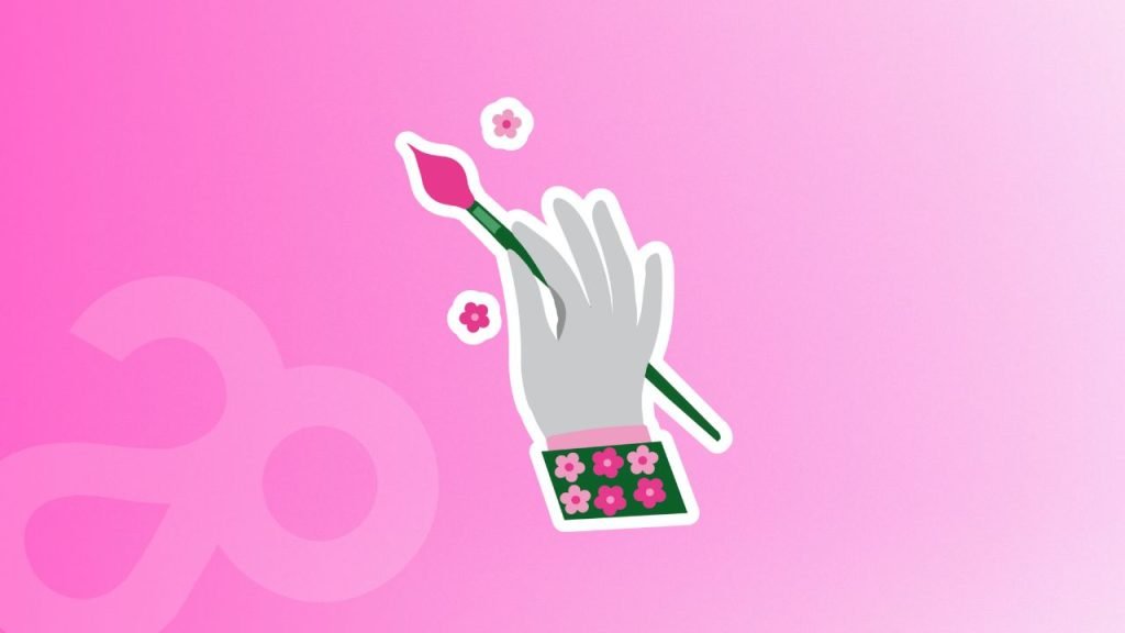 main avec un pinceau